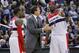 March 7, 2012; Washington, DC, USA; Washington Wizards head coach Randy Wittman (c) talks with power forward Andray Blatche (7) and guard Shelvin Mack (22) during a stoppage in play against the Los Angeles Lakers in the second half at Verizon Center. The Wizards won 106-101. Mandatory Credit: Geoff Burke-US PRESSWIRE