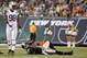 Aug 26, 2012; East Rutherford, NJ, USA; New York Jets defensive end Quinton Coples (98) walks away after hitting Carolina Panthers quarterback Cam Newton (1) during the first half at MetLife Stadium. Mandatory Credit: Ed Mulholland-US PRESSWIRE