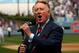 LOS ANGELES - APRIL 13: Dodgers broadcaster Vin Scully gives the call of 'It's time for Dodger baseball!' during pregame ceremonies for the Los Angeles Dodgers home opener against the San Francisco Giants on April 13, 2009 at Dodger Stadiium in Los Angeles, California. (Photo by Stephen Dunn/Getty Images)