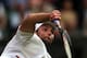 Ivo Karlovic serving against Andy Murray at 2012 Wimbledon.