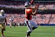 DENVER, CO - AUGUST 26: Wide receiver Eric Decker #87 of the Denver Broncos makes a catch for a touchdown as cornerback Tramaine Brock #26 of the San Francisco 49ers looks on during the first quarter of a pre-season game at Sports Authority Field Field at Mile High on August 26, 2012 in Denver, Colorado. (Photo by Justin Edmonds/Getty Images)
