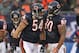 CHICAGO, IL - DECEMBER 04: Brian Urlacher #54 and Julius Peppers #90 of the Chicago Bears celebrate a defensive stop against the Kansas City Chiefs at Soldier Field on December 4, 2011 in Chicago, Illinois. The Chiefs defeated the Bears 10-3. (Photo by Jonathan Daniel/Getty Images)