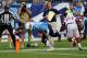NASHVILLE, TN - AUGUST 23: Kendall Wright #13 of the Tennessee Titans dives past Patrick Peterson #21 of the Arizona Cardinals for a touchdown at LP Field on August 23, 2012 in Nashville, Tennessee. (Photo by Frederick Breedon/Getty Images)