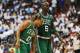 PHILADELPHIA, PA - MAY 18: Kevin Garnett #5 of the Boston Celtics comforts teammate Avery Bradley #0 as he winces in pain during the game against the Philadelphia 76ers in Game Four of the Eastern Conference Semifinals in the 2012 NBA Playoffs at the Wells Fargo Center on May 18, 2012 in Philadelphia, Pennsylvania. The Sixers won 92-83. NOTE TO USER: User expressly acknowledges and agrees that, by downloading and or using this photograph, User is consenting to the terms and conditions of the Getty Images License Agreement. (Photo by Drew Hallowell/Getty Images)