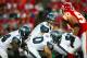 KANSAS CITY, MO - AUGUST 29: Quarterback Matt Hasselbeck #8 of the Seattle Seahawks calls signals out at the line of scrimmage against the Kansas City Chiefs during their preseason game at Arrowhead Stadium on August 29, 2009 in Kansas City, Missouri. (Photo by Dilip Vishwanat/Getty Images)
