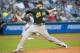 CLEVELAND, OH - AUGUST 27: Starting pitcher Brett Anderson #49 of the Oakland Athletics pitches during the second inning against the Cleveland Indians at Progressive Field on August 27, 2012 in Cleveland, Ohio. (Photo by Jason Miller/Getty Images)