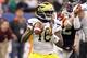 NEW ORLEANS, LA - JANUARY 03: Denard Robinson #16 of the Michigan Wolverines looks to pass against the Virginia Tech Hokies during the Allstate Sugar Bowl at Mercedes-Benz Superdome on January 3, 2012 in New Orleans, Louisiana. (Photo by Matthew Stockman/Getty Images)