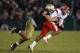 SOUTH BEND, IN - NOVEMBER 13: Manti Te'o #5 of the Notre Dame Fighting Irish brings down Terrance Cain #7 of the Utah Utes at Notre Dame Stadium on November 13, 2010 in South Bend, Indiana. Notre Dame defeated Utah 28-3. (Photo by Jonathan Daniel/Getty Images)