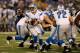BALTIMORE, MD - AUGUST 17: Quarterback Kellen Moore #17 of the Detroit Lions hands the ball off against the Baltimore Ravens at M&T Bank Stadium on August 17, 2012 in Baltimore, Maryland. (Photo by Rob Carr/Getty Images)