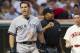 CLEVELAND, OH - AUGUST 25: Mark Teixeira #25 of the New York Yankees argues strike three with home plate umpire umpire Adrian Johnson #80 at the end of the top of the fourth inning against Cleveland Indians at Progressive Field on August 25, 2012 in Cleveland, Ohio. (Photo by Jason Miller/Getty Images)
