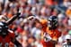 August 26, 2012; Denver, CO, USA; Denver Broncos quarterback Peyton Manning (18) throws the ball during the first quarter against the San Francisco 49ers at Sports Authority Field at Mile High. Mandatory Credit: Chris Humphreys-US PRESSWIRE