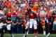 DENVER, CO - AUGUST 26: Quarterback Peyton Manning #18 of the Denver Broncos looks to pass during the first quarter of a pre-season game against the San Francisco 49ers at Sports Authority Field Field at Mile High on August 26, 2012 in Denver, Colorado. (Photo by Justin Edmonds/Getty Images)