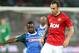 DURBAN, SOUTH AFRICA - JULY 18: Dimitar Berbatov of Manchester United holds off Tamsanqa Teyise of AmaZulu FC during the MTN Football Invitational match between Amazulu and Manchester United at Moses Mabhida Stadium on July 18, 2012 in Durban, South Africa. (Photo by Steve Haag/Gallo Images/Getty Images)