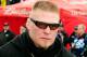DAYTONA BEACH, FL - FEBRUARY 13: MMA fighter Brock Lesnar walks in the garage area during practice for the Daytona 500 at Daytona International Speedway on February 13, 2010 in Daytona Beach, Florida. (Photo by Sam Greenwood/Getty Images for NASCAR)