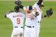 BALTIMORE, MD - AUGUST 28: Nate McLouth #9, Nick Markakis #21 and Adam Jones #10 of the Baltimore Orioles celebrate a win after a baseball game against the Chicago White Sox on August 28, 2012 at Orioles Park at Camden Yards in Baltimore, Maryland. (Photo by Mitchell Layton/Getty Images)
