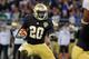 ORLANDO, FL - DECEMBER 29: Running back Cierre Wood #20 of the Notre Dame Fight Irish rushes upfield in the first quarter against the Florida State Seminoles in the Champs Sports Bowl December 29, 2011 at the Florida Citrus Bowl in Orlando, Florida. (Photo by Al Messerschmidt/Getty Images)