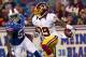 Aug. 9, 2012; Orchard Park, NY, USA; Washington Redskins cornerback Richard Crawford (39) runs with the ball while being defended by Buffalo Bills linebacker Nigel Bradham (53) at Ralph Wilson Stadium. Redskins beat the Bills 7-6. Mandatory Credit: Timothy T. Ludwig-US PRESSWIRE