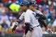 June 1, 2012; Detroit, MI, USA; New York Yankees center fielder Curtis Granderson (right) receives congratulations from right fielder Nick Swisher (33) after hitting a grand slam home run during the second inning against the Detroit Tigers at Comerica Park. Mandatory Credit: Rick Osentoski-US PRESSWIRE