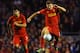 LIVERPOOL, ENGLAND - AUGUST 30: Steven Gerrard of Liverpool runs alongside Luis Suarez during the UEFA Europa League play-off round second leg between Liverpool and Hearts at Anfield on August 30, 2012 in Liverpool, England. (Photo by Laurence Griffiths/Getty Images)