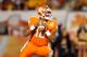 MIAMI GARDENS, FL - JANUARY 04: Tajh Boyd #10 of the Clemson Tigers looks to pass against the West Virginia Mountaineers during the Discover Orange Bowl at Sun Life Stadium on January 4, 2012 in Miami Gardens, Florida. (Photo by Mike Ehrmann/Getty Images)