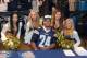 Jul 20, 2012; San Diego, CA, USA; San Diego Chargers running back Ryan Mathews (24) poses with Charger girls cheerleaders at the Chargers team store at the Qualcomm Stadium. Mandatory Credit: Kirby Lee/Image of Sport-US PRESSWIRE