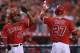 ANAHEIM, CA - AUGUST 30: Mike Trout (R) #27 of the Los Angeles Angels of Anaheim is congratulated by Howard Kendrick (L) #47 after scoring a run against the Boston Red Sox in the first inning at Angel Stadium of Anaheim on August 30, 2012 in Anaheim, California. (Photo by Jeff Gross/Getty Images)