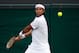 LONDON, ENGLAND - JUNE 29: Fernando Verdasco of Spain hits a backhand return during his Gentlemen's Singles third round match against Xavier Malisse of Belgium on day five of the Wimbledon Lawn Tennis Championships at the All England Lawn Tennis and Croquet Club on June 29, 2012 in London, England. (Photo by Dan Kitwood/Getty Images)
