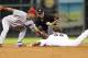 HOUSTON, TX - AUGUST 31: Brett Wallace #29 of the Houston Astros doubles in the eighth inning as Wilson Valdez #15 of the Cincinnati Reds applies the tag at Minute Maid Park on August 31, 2012 in Houston, Texas. (Photo by Bob Levey/Getty Images)