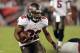 August 24, 2012; Tampa, FL, USA; Tampa Bay Buccaneers running back Doug Martin (22) runs with the ball during the second quarter against the New England Patriots at Raymond James Stadium. Mandatory Credit: Kim Klement-US PRESSWIRE