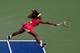 NEW YORK, NY - AUGUST 30: Serena Williams of the United States returns a shot against Maria Jose Martinez Sanchez of Spain during their women's singles second round match on Day Four of the 2012 U.S. Open at the USTA Billie Jean King National Tennis Center on August 30, 2012 in the Flushing neighborhood, of the Queens borough of New York City. (Photo by Chris Trotman/Getty Images for USTA)