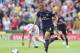 STOKE ON TRENT, ENGLAND - AUGUST 26: Lukas Podolski of Arsenal runs with the ball during the Barclays Premier League match between Stoke City and Arsenal at the Britannia Stadium on August 26, 2012 in Stoke on Trent, England. (Photo by David Rogers/Getty Images)