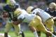 DUBLIN, IRELAND - SEPTEMBER 01: Navy's Trey Miller being tackled by Notre Dame's Everett Golson during the Notre Dame vs Navy game at Aviva Stadium on September 1, 2012 in Dublin, Ireland.(Photo by Barry Cronin/Getty Images)