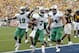 PITTSBURGH, PA - SEPTEMBER 01: Travon Van #7 of the Marshall Thundering Herd celebrates after rushing for a touchdown against the West Virginia Mountaineers during the game on September 1, 2012 at Mountaineer Field in Morgantown, West Virginia. (Photo by Justin K. Aller/Getty Images)