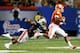 ATLANTA, GA - SEPTEMBER 01: Tajh Boyd #10 of the Clemson Tigers rushes away from Daren Bates #25 of the Auburn Tigers at Georgia Dome on September 1, 2012 in Atlanta, Georgia. (Photo by Kevin C. Cox/Getty Images)