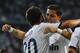 MADRID, SPAIN - AUGUST 29: Gonzalo Higuain of Real Madrid (L) celebrates with his teammate Cristiano Ronaldo after scoring the opening goal during the Super Cup second leg match betwen Real Madrid and FC Barcelona at Estadio Santiago Bernabeu on August 29, 2012 in Madrid, Spain. (Photo by David Ramos/Getty Images)