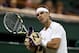 LONDON, ENGLAND - JUNE 28: Rafael Nadal of Spain reacts during his Gentlemen's Singles second round match against Lukas Rosol of the Czech Republic on day four of the Wimbledon Lawn Tennis Championships at the All England Lawn Tennis and Croquet Club on June 28, 2012 in London, England. (Photo by Clive Rose/Getty Images)
