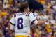 BATON ROUGE, LA - SEPTEMBER 01: Zach Mettenberger #8 of the LSU Tigers waves as he runs off the field after suffering an injury against the North Texas Mean Green at Tiger Stadium on September 1, 2012 in Baton Rouge, Louisiana. Mettenberger would return in the first half. (Photo by Chris Graythen/Getty Images)