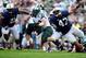 Sep 1, 2012; University Park, PA, USA; Ohio Bobcats running back Beau Blankenship (22) runs the ball away from Penn State Nittany Lions defensive lineman Jordan Hill (47) in the fourth quarter at Beaver Stadium. Mandatory Credit: Andrew Weber-US Presswire