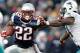 FOXBORO, MA - DECEMBER 24: Stevan Ridley #22 of the New England Patriots stiff arms Cameron Wake #91 of the Miami Dolphins during the fourth quarter of New England's 27-24 win at Gillette Stadium on December 24, 2011 in Foxboro, Massachusetts. (Photo by Winslow Townson/Getty Images)
