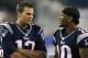 FOXBORO, MA - AUGUST 9: Tom Brady #12 of the New England Patriots and Jabar Gaffney chat on the sidelines in a preseason game against the Orleans Saints in the first half at Gillette Stadium on August 9, 2012 in Foxboro, Massachusetts. (Photo by Jim Rogash/Getty Images)