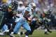 SEATTLE, WA - AUGUST 11: Running back Chris Johnson #28 of the Tennessee Titans rushes against the Seattle Seahawks at CenturyLink Field on August 11, 2012 in Seattle, Washington. (Photo by Otto Greule Jr/Getty Images)