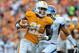 Oct 1, 2011; Knoxville,TN, USA; Tennessee Volunteers wide receiver Da'Rick Rogers (21) catches a pass to rush for a touchdown against the Buffalo Bulls during the first half at Neyland Stadium. Mandatory Credit: Jim Brown-US PRESSWIRE