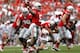 COLUMBUS, OH - SEPTEMBER 1: Kent Kern #43 of the Miami Redhawks hits Braxton Miller #5 of the Ohio State Buckeyes as he throws the ball downfield during the second quarter on September 1, 2012 at Ohio Stadium in Columbus, Ohio. (Photo by Kirk Irwin/Getty Images)