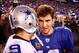 EAST RUTHERFORD, NJ - JANUARY 01: Tony Romo #9 of the Dallas Cowboys and Eli Manning #10 of the New York Giants greet each other after their game at MetLife Stadium on January 1, 2012 in East Rutherford, New Jersey. (Photo by Jeff Zelevansky/Getty Images)