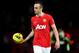 MANCHESTER, ENGLAND - DECEMBER 26: Dimitar Berbatov of Manchester United walks off with the match ball after scoring a hat trick at the end of the Barclays Premier League match between Manchester United and Wigan Athletic at Old Trafford on December 26, 2011 in Manchester, England. (Photo by Alex Livesey/Getty Images)