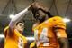 ATLANTA, GA - AUGUST 31: Tyler Bray #8 of the Tennessee Volunteers puts the leather helmet on Cordarrelle Patterson #84 after their 35-21 win over the North Carolina State Wolfpack at Georgia Dome on August 31, 2012 in Atlanta, Georgia. (Photo by Kevin C. Cox/Getty Images)