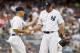 NEW YORK, NY - SEPTEMBER 02: Joe Girardi #28 takes the ball from Derek Lowe #34 of the New York Yankees against the Baltimore Orioles at Yankee Stadium on September 2, 2012 in the Bronx borough of New York City. (Photo by Jeff Zelevansky/Getty Images)