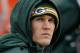 GREEN BAY, WI - JANUARY 01: Clay Matthews #52 of the Green Bay Packers, who did not dress for a game against the Detroit Lions, watches from the bench at Lambeau Field on January 1, 2012 in Green Bay, Wisconsin. The Packers defeated the Lions 45-41. (Photo by Jonathan Daniel/Getty Images)