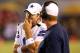 SAN DIEGO, CA - AUGUST 18: Quarterback Tony Romo #9 and head coach Jason Garrett of the Dallas Cowboys talk things over during a Cowboy drive in the fourth quarter against the San Diego Chargers at Qualcomm Stadium on August 18, 2012 in San Diego, California. The Chargers won 28-20. (Photo by Stephen Dunn/Getty Images)