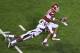 Sep 11, 2010; Little Rock, AR, USA; Arkansas Razorbacks wide receiver Greg Childs (85) is tackled by ULM Warhawks cornerback Nate Brown (26) during the second half at War Memorial Stadium. Arkansas defeated ULM 31-7. Mandatory Credit: Nelson Chenault-US PRESSWIRE